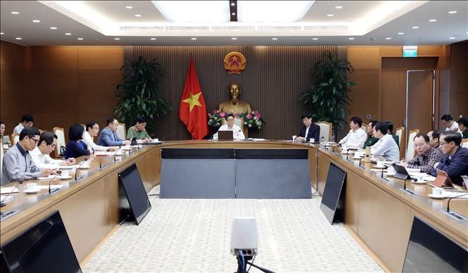 Quang cảnh cuộc họp. Ảnh: Phạm Kiên - TTXVN Tạo mọi điều kiện thuận lợi cho các đơn vị trong nước nghiên cứu, sản xuất vaccine ngừa COVID-19 ảnh 2