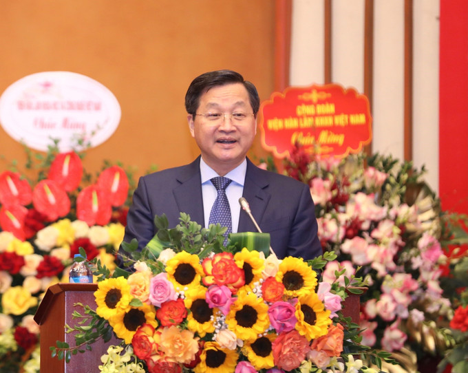 Bí thư Trung ương Đảng, Phó Thủ tướng Chính phủ Lê Minh Khái phát biểu giao nhiệm vụ. Ảnh: Hoàng Hiếu - TTXVN Công bố quyết định bổ nhiệm Chủ tịch Viện Hàn lâm Khoa học xã hội Việt Nam ảnh 1