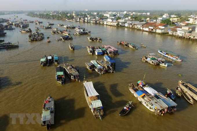 Chợ nổi Cái Răng (Cần Thơ) từ lâu đã là một điểm tham quan du lịch đặc sắc của vùng Đồng bằng sông Cửu Long nói chung và thành phố Cần Thơ nói riêng.Ảnh: An Hiếu - TTXVN Du lịch Việt Nam: Bảo tồn và phát triển chợ nổi Cái Răng ảnh 2