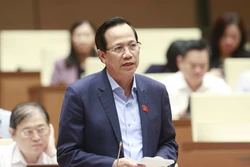 Bộ trưởng Bộ Lao động – Thương binh và Xã hội Đào Ngọc Dung làm rõ một số vấn đề đại biểu Quốc hội nêu. Ảnh: Doãn Tấn - TTXVN