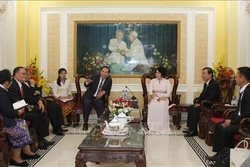 Thành phố Hồ Chí Minh và thủ đô Viêng Chăn (Lào) chia sẻ kinh nghiệm về công tác Mặt trận