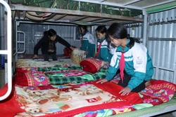 Trường Phổ thông Dân tộc bán trú Tiểu học Dào San, huyện Phong Thổ (Lai Châu) chuẩn bị đầy đủ chăn, đệm ấm cho học sinh ở bán trú. Ảnh: Đinh Thùy-TTXVN