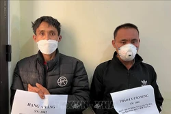 Hai đối tượng Hạng A Vàng và Thào Ly Páo Sồng. Ảnh: TTXVN phát