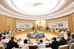 Quang cảnh hội nghị tại điểm cầu Chính phủ. Ảnh: Dương Giang-TTXVN 