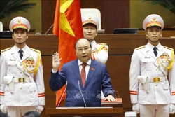 Chủ tịch nước Nguyễn Xuân Phúc tuyên thệ nhậm chức trước Quốc hội, đồng bào và cử tri cả nước. Ảnh: Phạm Kiên - TTXVN