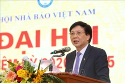 Ông Hồ Quang Lợi, Phó Chủ tịch Thường trực Hội Nhà báo Việt Nam báo cáo tóm tắt Đề án về phương án nhân sự nhiệm kỳ 2020-2025. Ảnh: Tuấn Đức - TTXVN 