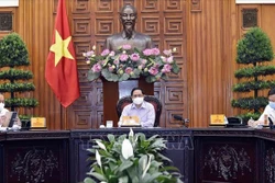 Thủ tướng Phạm Minh Chính chủ trì cuộc họp Thường trực Chính phủ về công tác tổ chức bầu cử trong bối cảnh dịch bệnh COVID-19. Ảnh : TTXVN