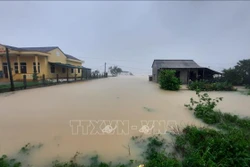 Nước lũ gây ngập lụt tại xã Cam Thụy, huyện Cam Lộ. Ảnh: Hồ Cầu - TTXVN