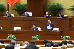 Bộ trưởng Bộ Tài Chính Hồ Đức Phớc giải trình, làm rõ một số vấn đề đại biểu Quốc hội nêu. Ảnh: Văn Điệp - TTXVN