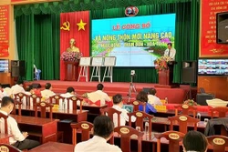 Quang cảnh Lễ công bố xã nông thôn mới nâng cao. Ảnh: Trung Hiếu - TTXVN