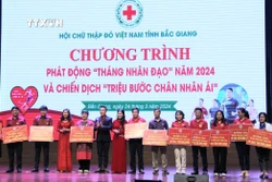 Các đơn vị đăng ký ủng hộ Tháng Nhân đạo tỉnh Bắc Giang. Ảnh: Đồng Thúy - TTXVN
