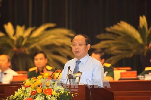 Phó Bí thư Thường trực Thành ủy Thành phố Hồ Chí Minh Tất Thành Cang phát biểu tại hội thảo. Ảnh: Thanh Vũ-TTXVN