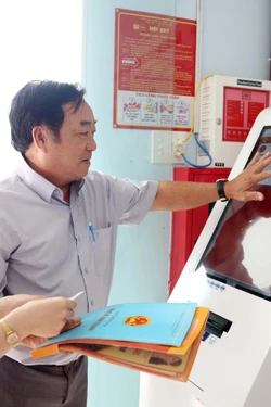 Đồng bộ tổ chức, nâng chất phục vụ nhân dân