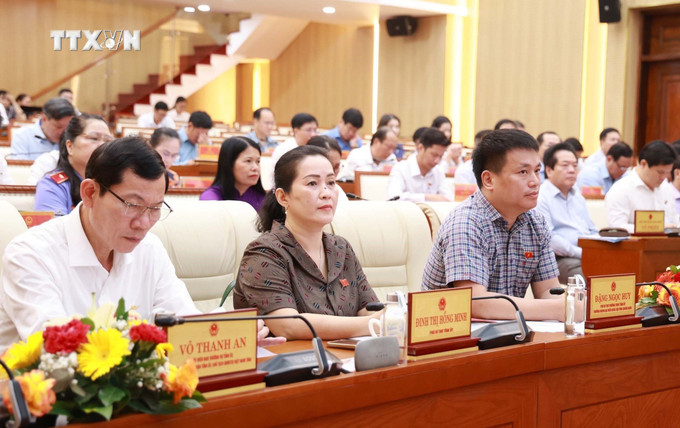 Các đại biểu tham dự kỳ họp. Ảnh: TTXVN phát vna_potal_bai_nhiem_tu_cach_dai_bieu_hdnd_chuc_vu_chu_tich_ubnd_tinh_quang_ngai_doi_voi_ong_dang_van_minh_7361619.jpg