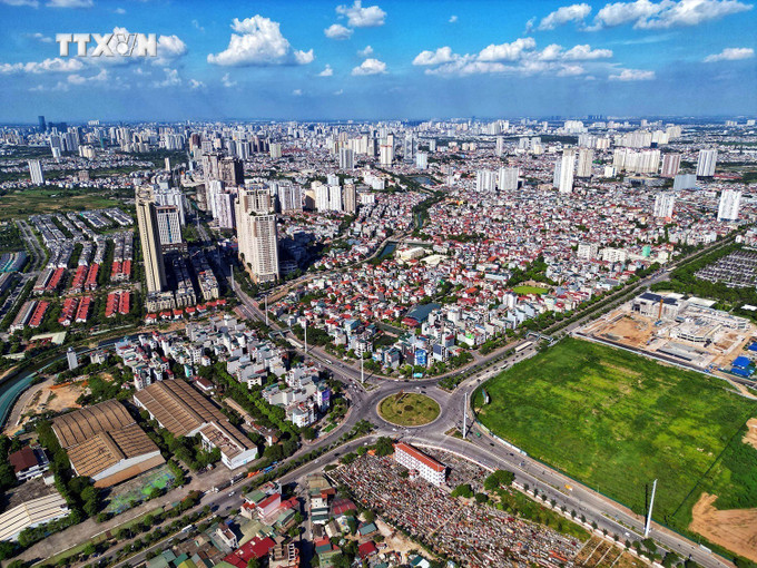 Trong 6 tháng đầu năm đã có 18 dự án nhà ở thương mại hoàn thành, 23 dự án được cấp phép mới và 984 dự án đang được triển khai. Ảnh: Tuấn Anh - TTXVN vna_potal_thi_truong_bat_dong_san_co_nhieu_dau_hieu_khoi_sac_7496444.jpeg
