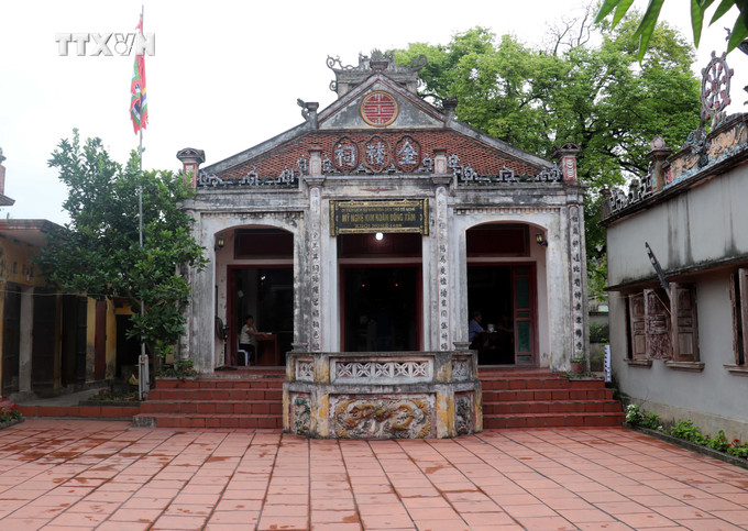 Nơi thờ cụ tổ nghề chạm bạc Nguyễn Kim Lâu, người đã có công truyền dạy cho nhân dân làng Đồng Xâm nghề vàng bạc cao quý. Ảnh: Vũ Quang - TTXVN vna_potal_thai_binh_doc_dao_le_hoi_dong_xam_7365732.jpg