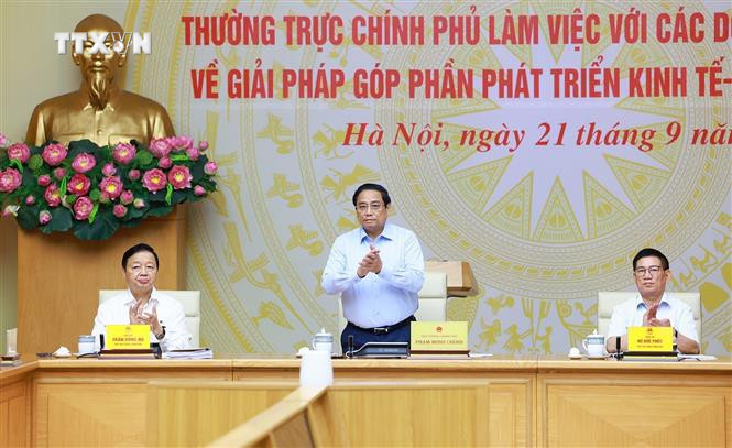Thủ tướng Phạm Minh Chính chủ trì Hội nghị. Ảnh: Dương Giang - TTXVN vna_potal_thuong_truc_chinh_phu_lam_viec_voi_cac_doanh_nghiep_lon_ve_giai_phap_gop_phan_phat_trien_kinh_te-xa_hoi_7608255.jpg
