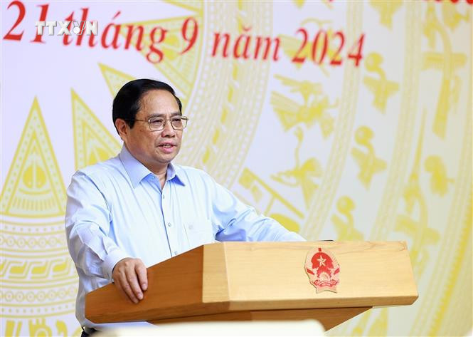 Thủ tướng Phạm Minh Chính chủ trì hội nghị. Ảnh: Dương Giang - TTXVN vna_potal_thuong_truc_chinh_phu_lam_viec_voi_cac_doanh_nghiep_lon_ve_giai_phap_gop_phan_phat_trien_kinh_te-xa_hoi_7608263.jpg
