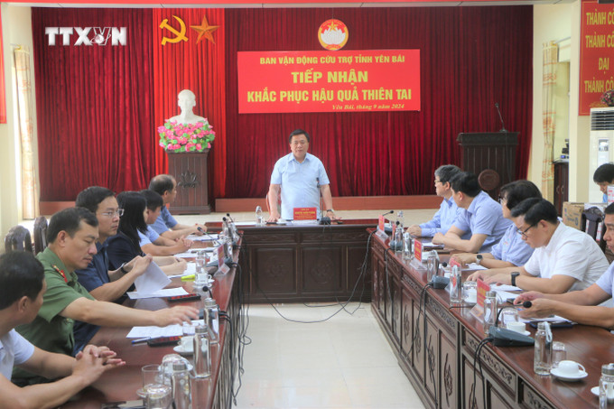 Đồng chí Nguyễn Xuân Thắng làm việc tại Ủy ban Mặt trận Tổ quốc Việt Nam tỉnh Yên Bái về công tác khắc phục thiệt hại do bão số 3 gây ra. Ảnh: Tuấn Anh - TTXVN vna_potal_uy_vien_bo_chinh_tri_nguyen_xuan_thang_tham_dong_vien_nguoi_dan_vung_lu_yen_bai_7596954.jpg