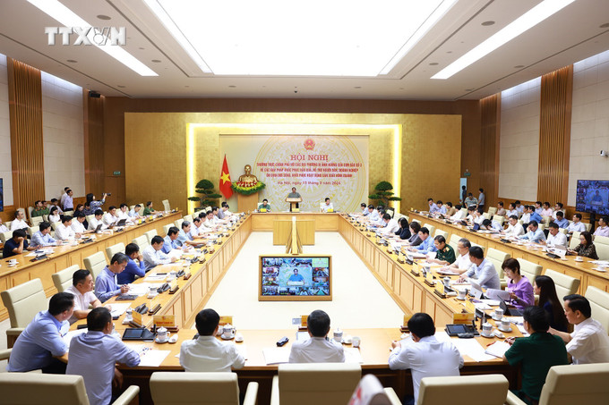 Hội nghị Thường trực Chính phủ với các địa phương về khắc phục hậu quả cơn bão số 3. Ảnh: Dương Giang - TTXVN vna_potal_hoi_nghi_thuong_truc_chinh_phu_voi_cac_dia_phuong_ve_giai_phap_khac_phuc_thiet_hai_cua_con_bao_so_3_7596544 (1).jpg