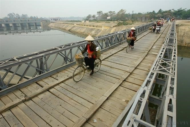 Cầu Mường Thanh ngày hôm nay được lưu giữ thành một di tích lịch sử. Ảnh: Huy Hùng/TTXVN dienbien-15.jpg