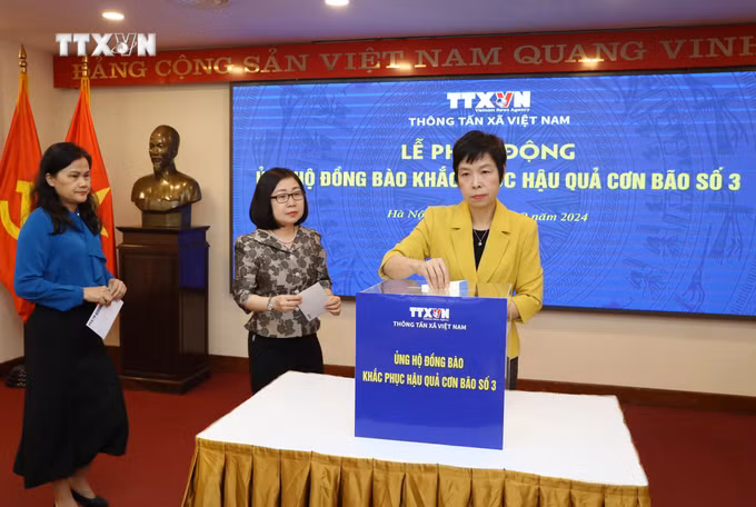 vna_potal_thong_tan_xa_viet_nam_ung_ho_dong_bao_khac_phuc_hau_qua_con_bao_so_3_7588205.jpg